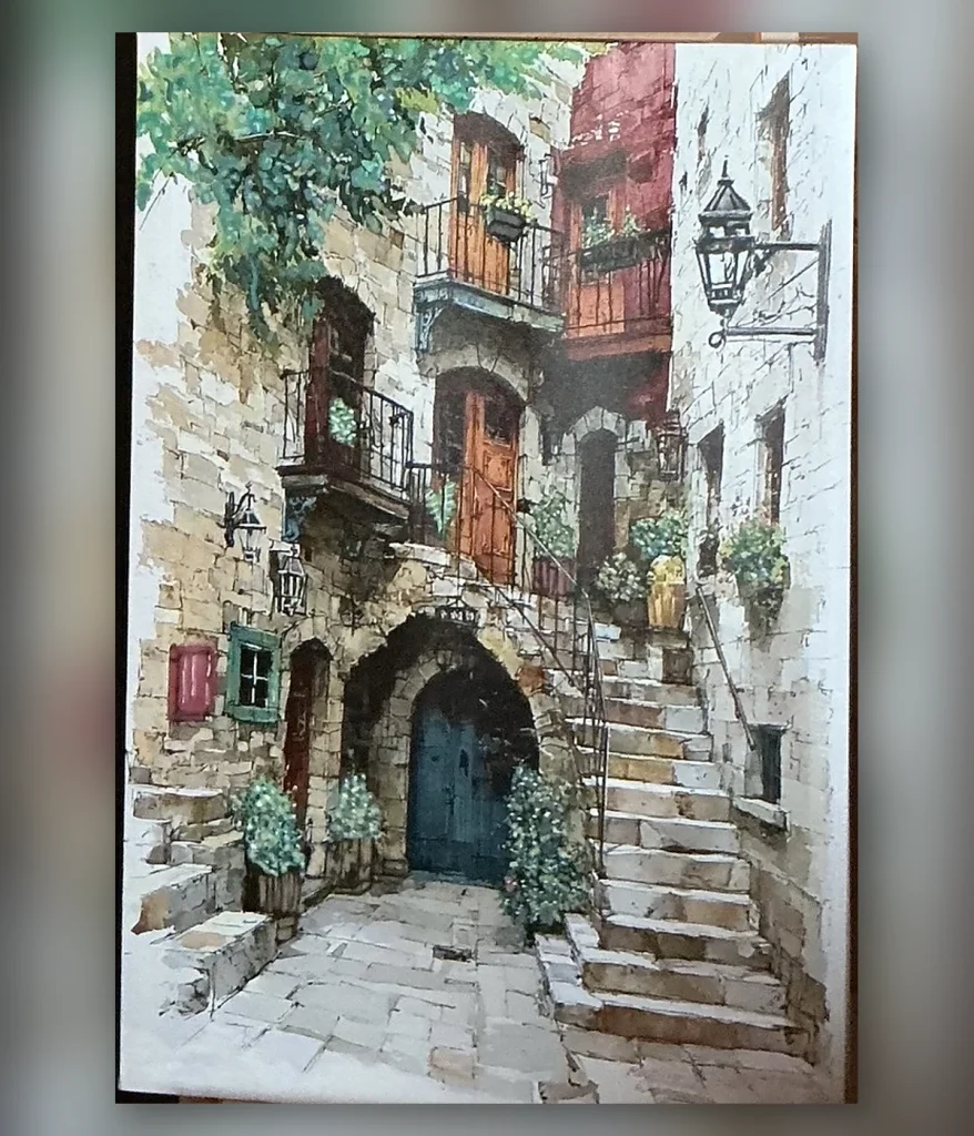 Old stone alley with stairs, balconies, and lanterns