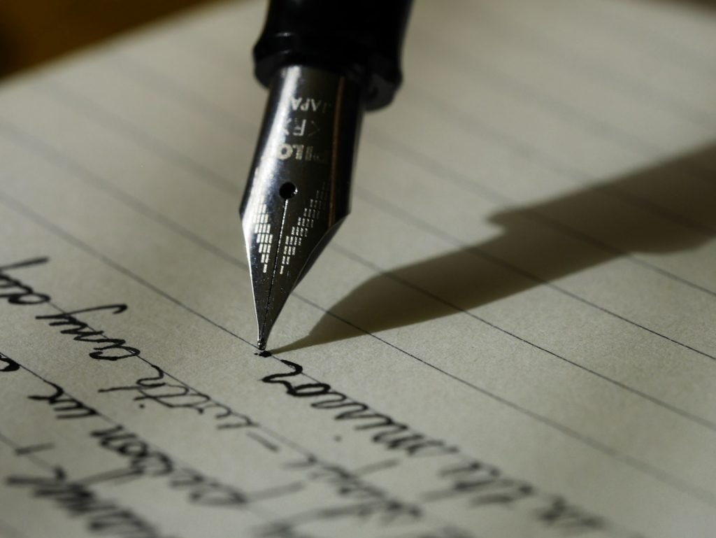 Open notebook and writing